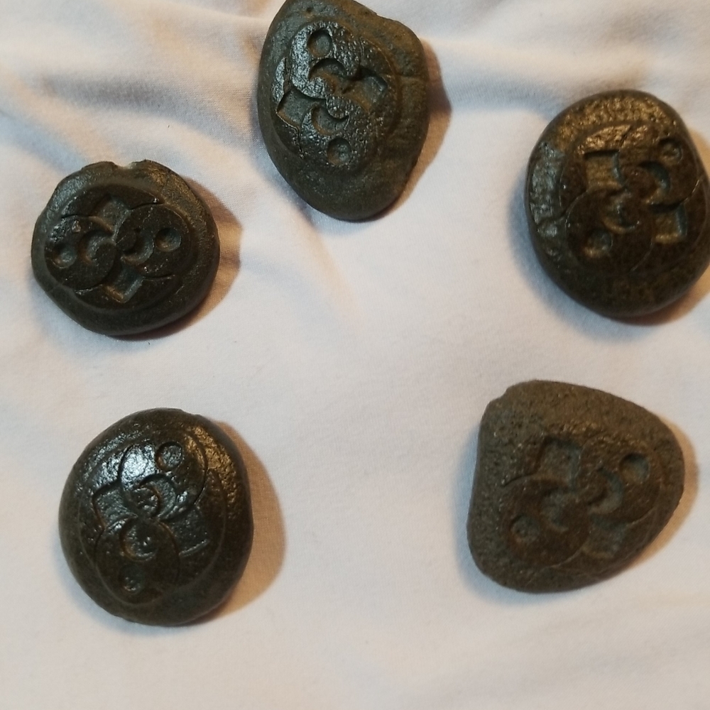 Replica pendant of famous Roswell Stone found in 2004 near alien crash site